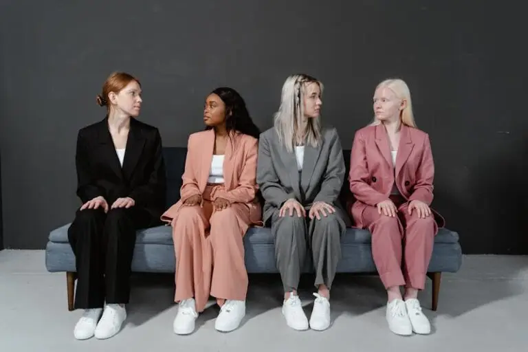 Aspiring fashion model attending a casting call in London while waiting among other models in a professional studio setting