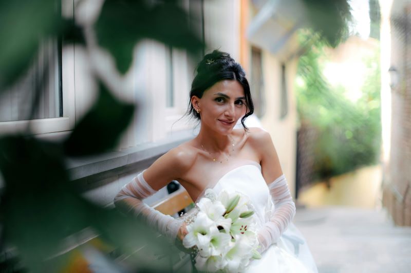 Aspiring UK model smiling while networking at a fashion event, building industry connections
