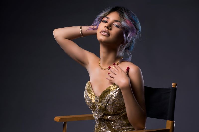 Aspiring UK model practicing runway walk with confidence and poise