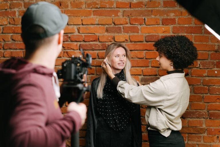 UK fashion model collaborating with a creative team during a professional photoshoot briefing